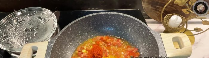 Add turmeric powder, Kashmiri red chili powder, regular chili powder, coriander powder, and garam masala. Sauté well with tomatoes.