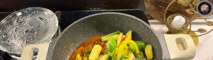 Add the sautéed vegetables and cheese to the sauce.