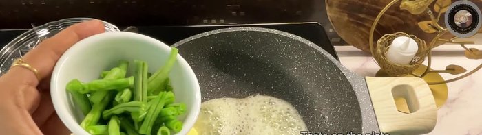 Add French beans and sauté lightly for a few seconds.