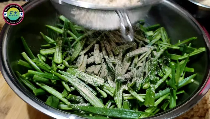 Sieve the masala to remove any lumps. Add a little water to help the masala stick to the okra.