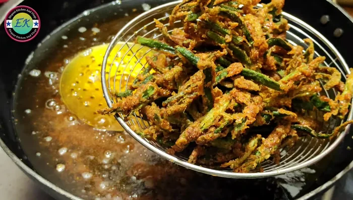 Remove the fried okra and place it in a sieve to drain excess oil.