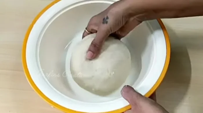 Shape the dough into a ball, cover, and let it rest for 30 minutes.