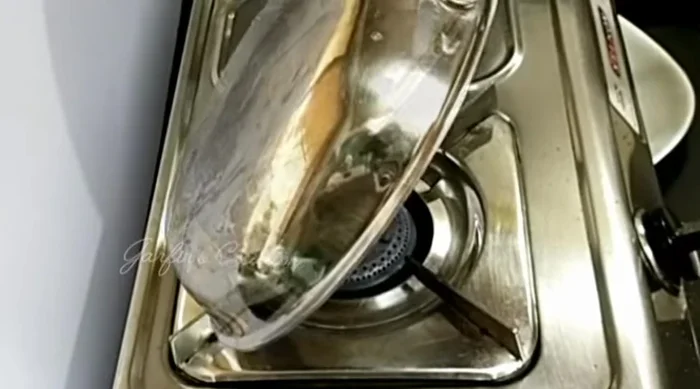 Keep moving the pan to ensure even cooking. Cover for 2-3 minutes to cook through. Brush with butter while still hot.