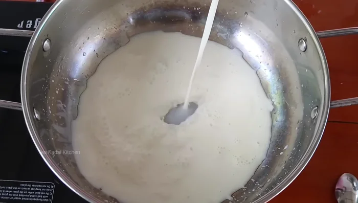 In a large bowl, heat 1 liter of full cream milk (plus packet milk) on high heat.
