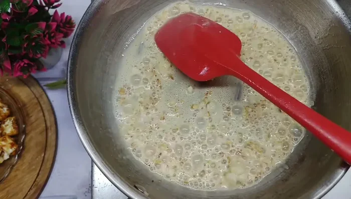 Add cornflour (or all-purpose flour/refined flour), black pepper, Kashmiri chili powder, chili flakes, and pizza seasoning. Fry until fragrant.