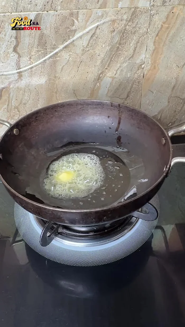 Heat oil and butter in a pan over high heat. Add the marinated chicken and cook until the moisture evaporates and the chicken is browned.