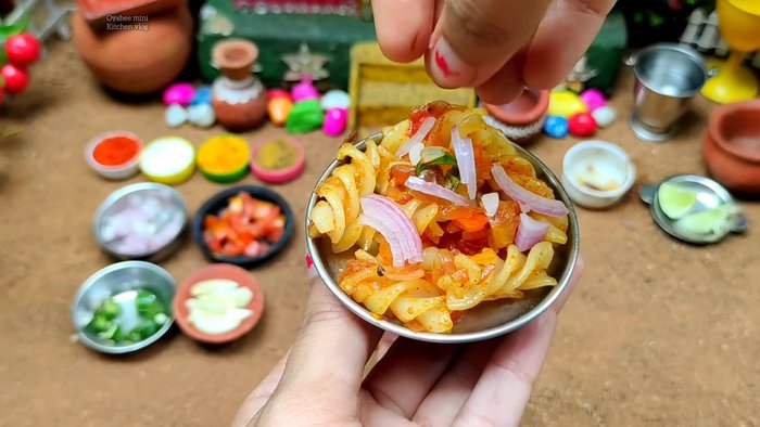 Prepare the vegetables. Chop them into small pieces appropriate for miniature pasta.