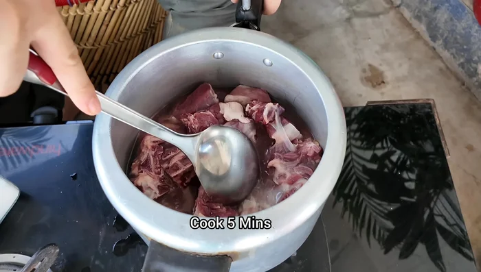Boil mutton with 1.5 cups of water and salt for 5-6 minutes on high flame.