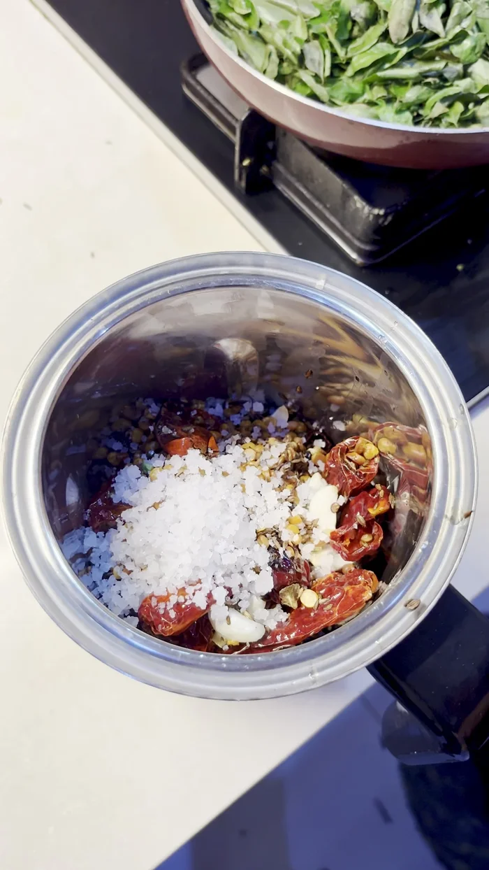Add salt (1 1/2 tablespoons or to taste) to the ground mixture and blend again.
