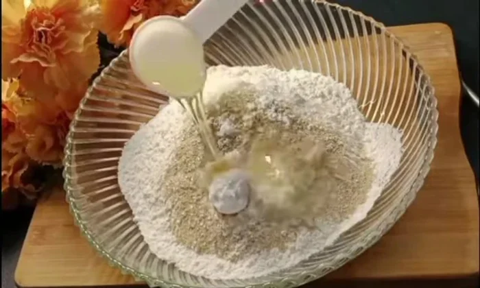 Make the dough: In a bowl, combine flour, sugar, yeast, salt, ghee, curd, and gradually add water to form a smooth dough.