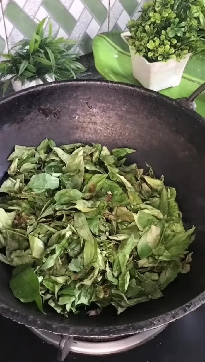 Dry fry curry leaves until crunchy.