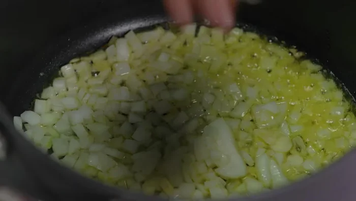 Add minced garlic, chili, and ginger. Cook for a short while.