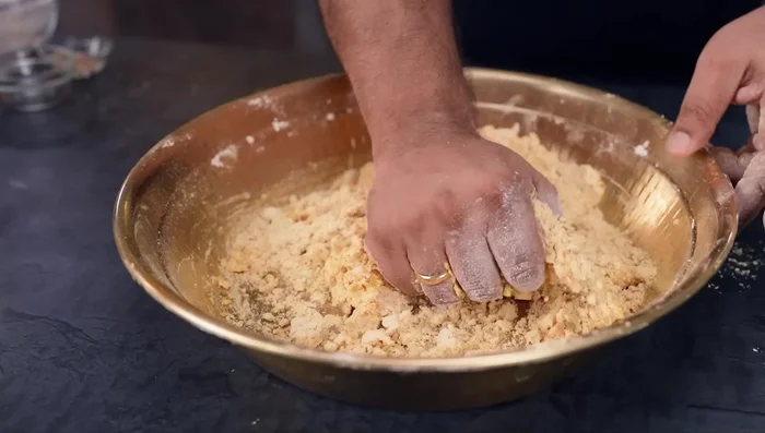 Knead the dough: Add water and knead into a tight dough. Let it rest for 10-15 minutes.