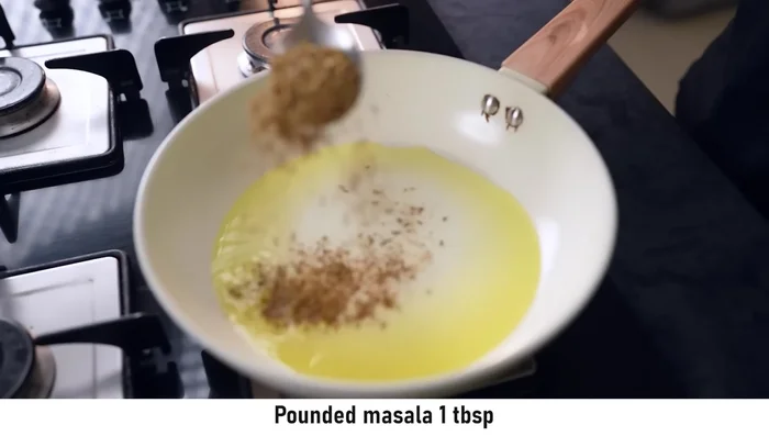 Sauté the masala: Heat ghee in a pan. Add the ground masala and cook slightly. Add dried red chilies and asafoetida.