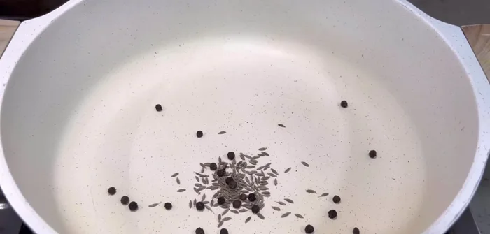 Roast cumin seeds, whole black pepper, and red chilies in a pan until fragrant. Grind into a powder.