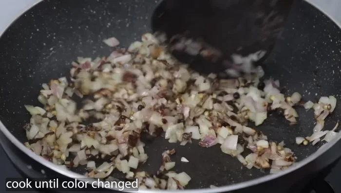 Add 1 tsp of ginger-garlic paste and sauté until the raw smell disappears.