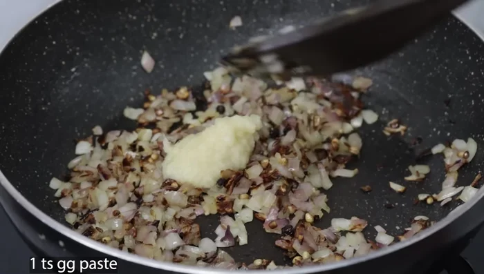 Add 2 medium finely chopped tomatoes and sauté until softened.