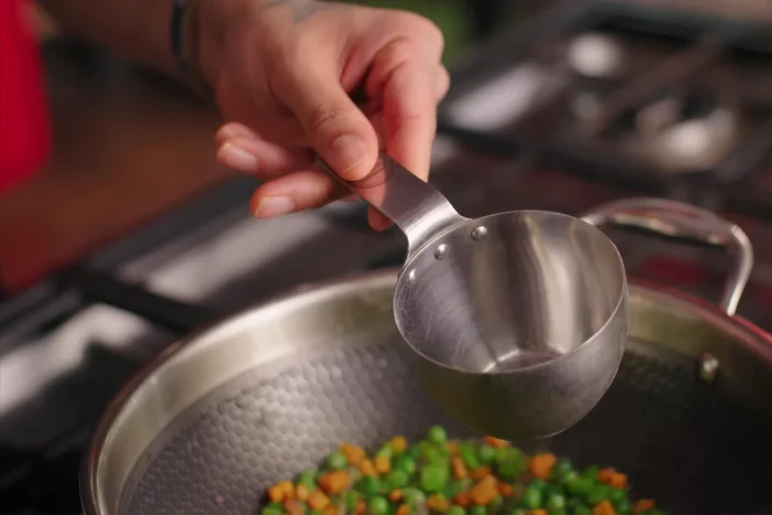 Add water and semolina: Add water (three times the amount of semolina), salt, sugar, and pepper. Bring to a boil. Add the roasted semolina, stirring continuously to prevent lumps.