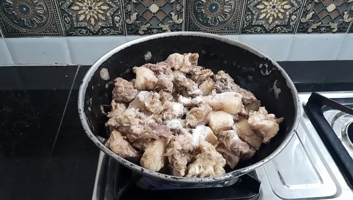 Add salt to taste and mix well. Continue frying until the meat releases its water and the water evaporates.