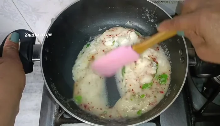 Stir continuously until the semolina absorbs the water and a dough forms (about 1-2 minutes). Turn off the heat.