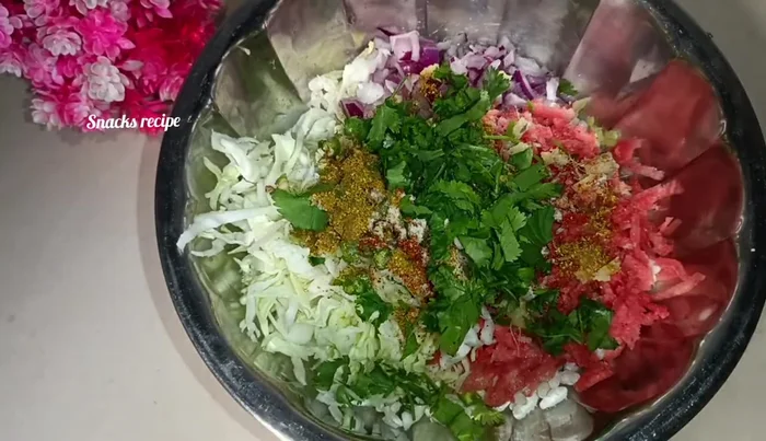 Mix all ingredients thoroughly. The vegetables will release moisture, so there's no need to pre-soak the puffed rice.
