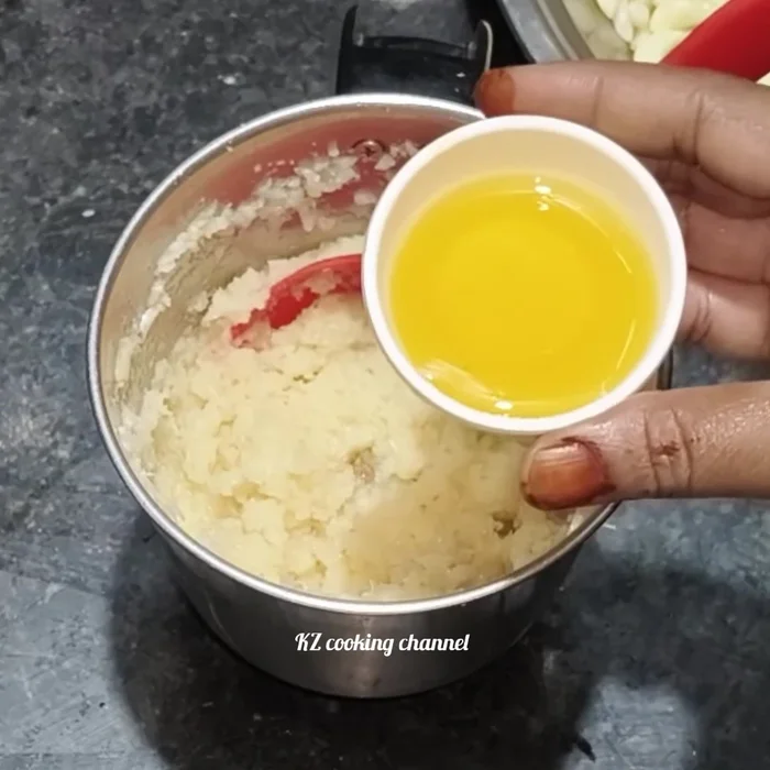 Add ½ tablespoon of cooking oil and a pinch of salt to the ground garlic.