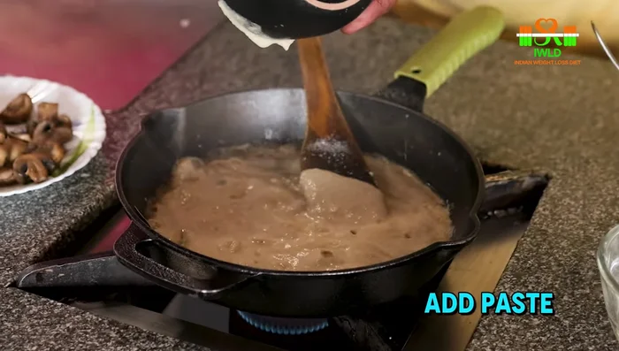 Add the onion-garlic-ginger paste and fry well. Add water and let it boil until the water dries up.