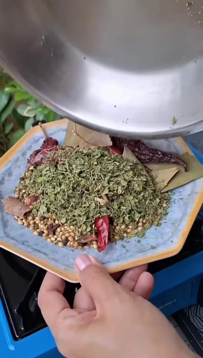 Remove the Kasuri Methi and add to the bowl of spices.