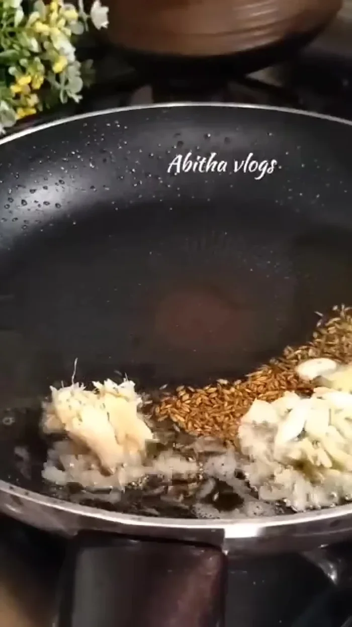 Add crushed ginger and garlic, fry well.