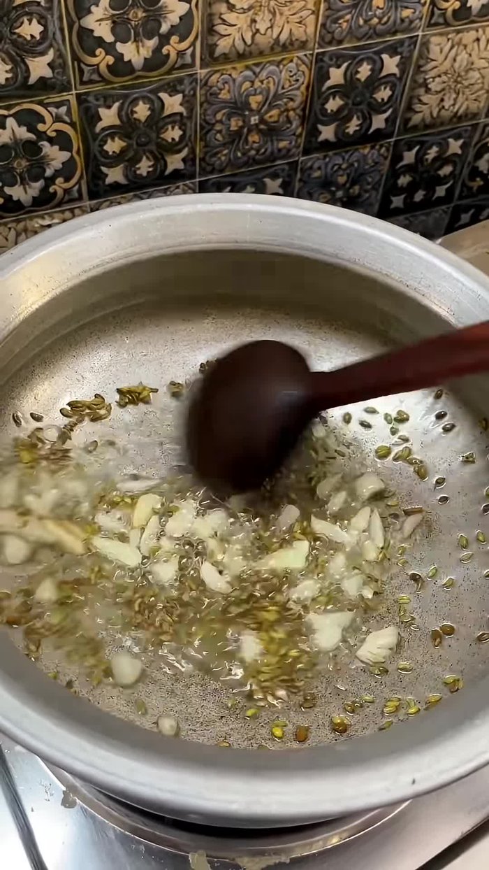 Add two green chilies.