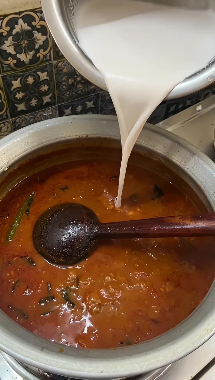 Add about half a lid of coconut milk and mix well.