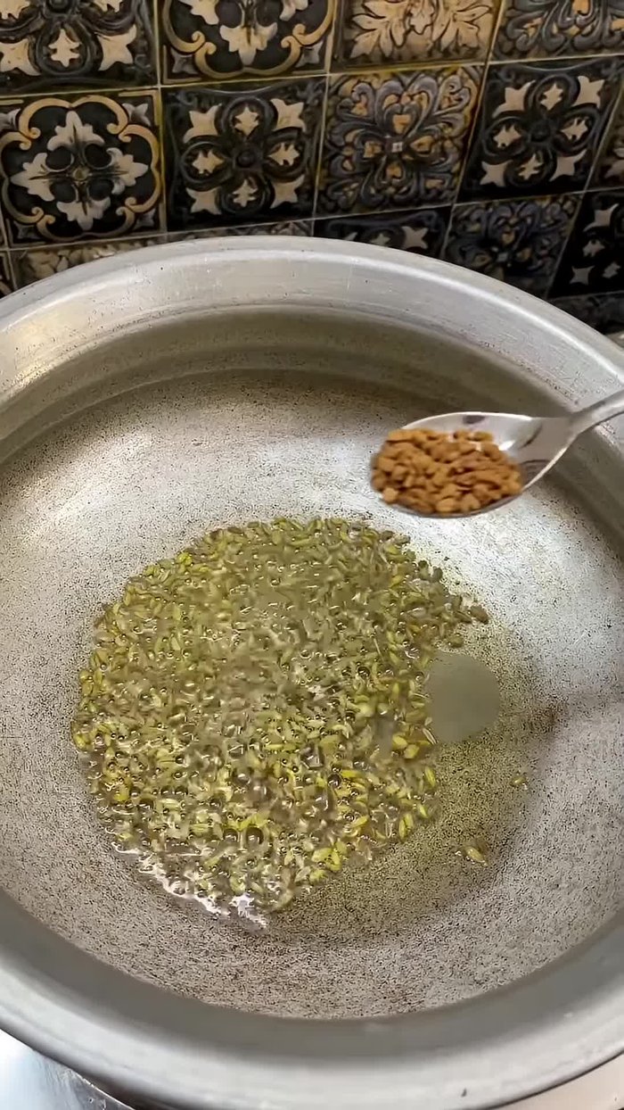 Add one spoon of anise and half a spoon of fenugreek.