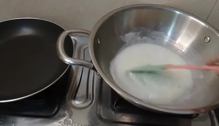 Boil the milk slightly, then add sugar and 1/2 tablespoon of ghee (ghee adds shine).
