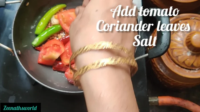Add 2 chopped tomatoes.