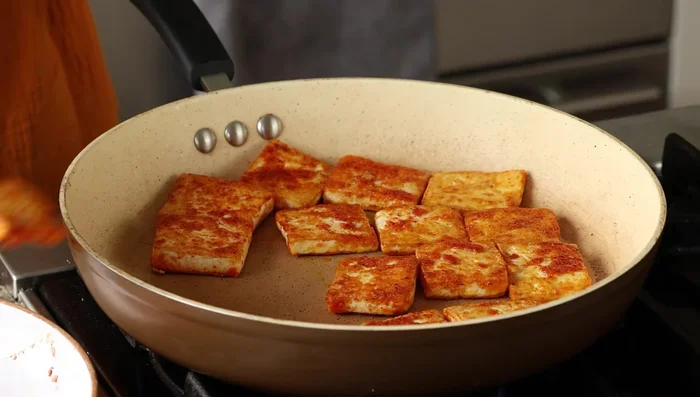 Remove tofu from skillet and set aside.