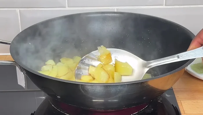 Fry potatoes until crispy.