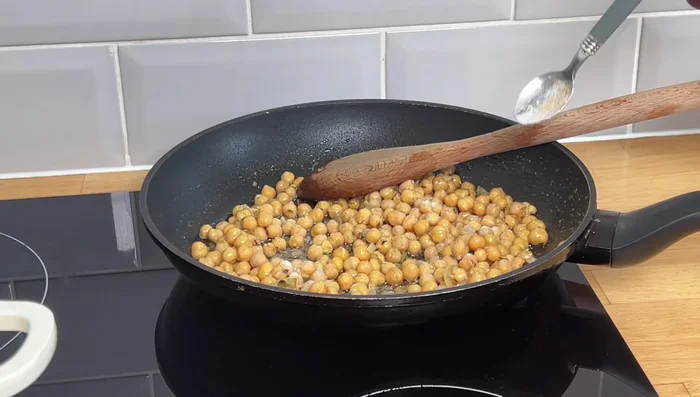 Add chopped chickpeas and mix well.