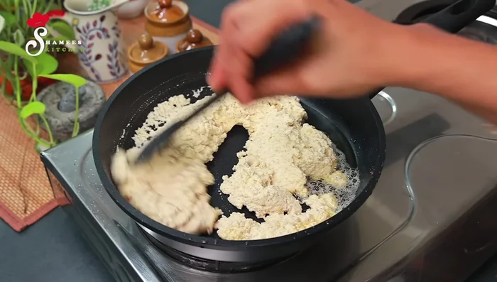 Add the coconut-chickpea mixture to the pan with the fried coconut slices. Fry until heated through.