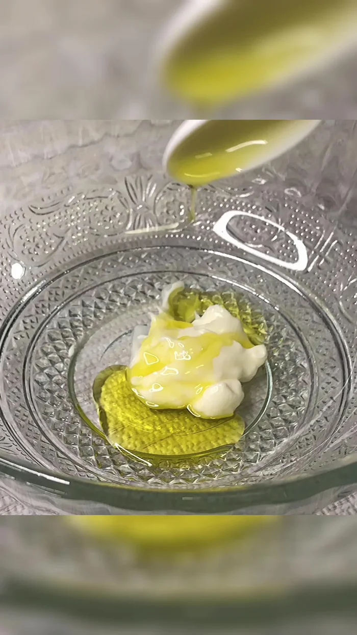 Make the dressing for the cabbage salad: Combine mayonnaise, olive oil, chopped coriander stems, chopped jalapenos, mustard powder, pepper, garlic powder, salt, and lime juice.