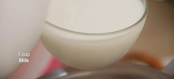 Add 1 cup of milk (measured using the serving cup).