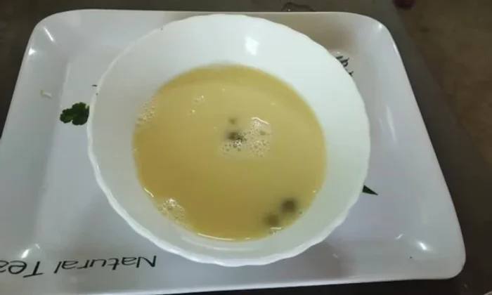 Divide the custard in half. Add the baked bread to half of the custard.