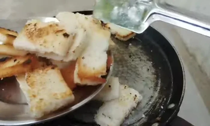 Set aside to cool. The bread will crisp as it cools.