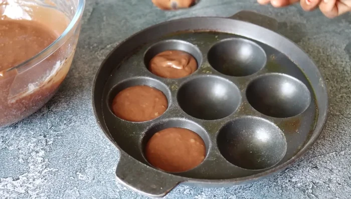 Add a little more batter on top of the chocolate pieces.