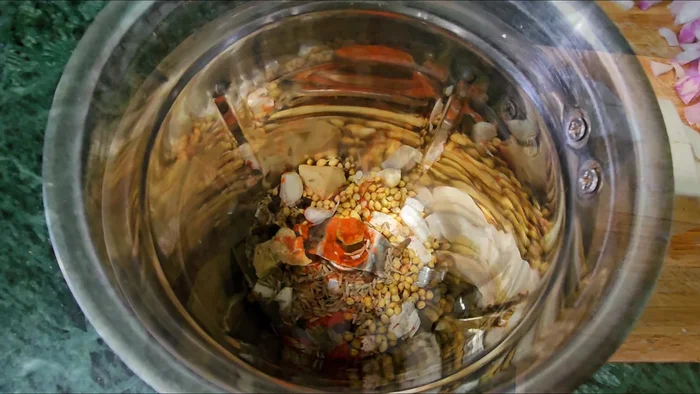 Grind together cumin, coriander, bay leaves, cinnamon, cloves, red chili (adjust to taste).