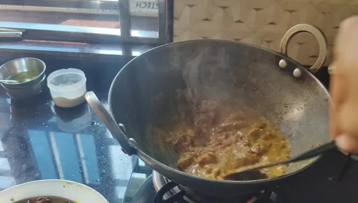 Add the cooked potatoes to the masala.