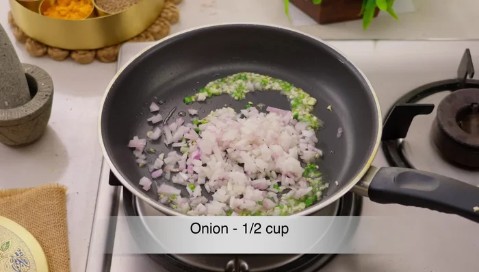 Add chopped onion and fry until slightly softened.