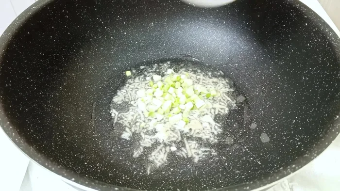 Add onions and fry until softened.