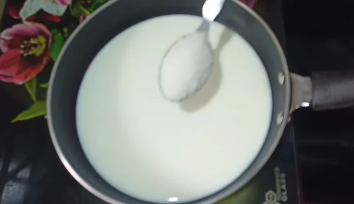 In a saucepan, heat 1 cup of milk and add sugar. Bring to a boil. (229.76)