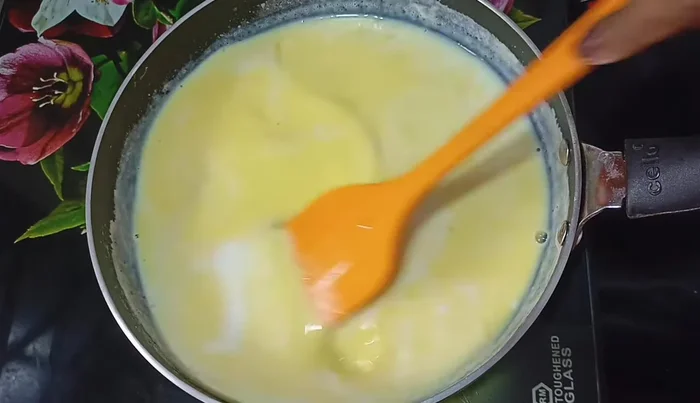 Once boiling, gradually whisk in the custard mixture, stirring constantly until thickened (about 30 seconds). (299.199)