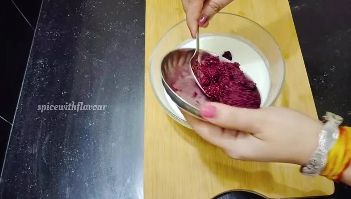 Add the blended beetroot to the curd and mix well.